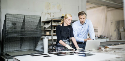 Man and a Woman Running Their Small Business in the Inc. Report on Thryv's Small Business Software.